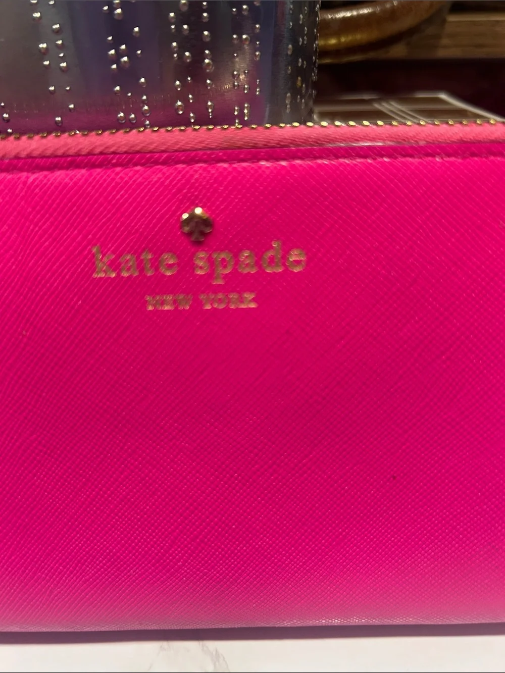 kate spade bright fuchsia zip-around wallet with gold logo